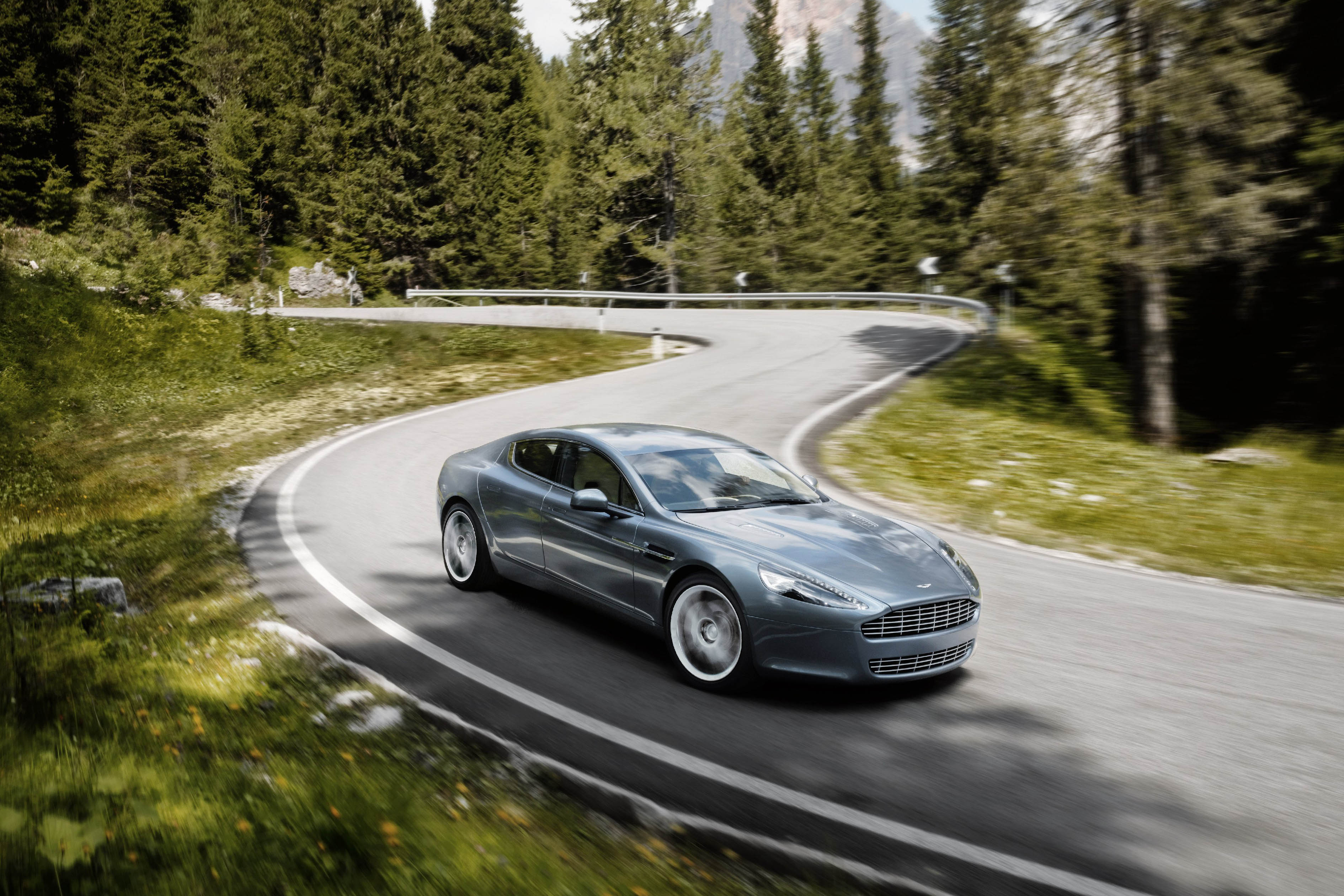 Картинка машина на дороге. Aston Martin db9. Автомобили Aston Martin rapide.